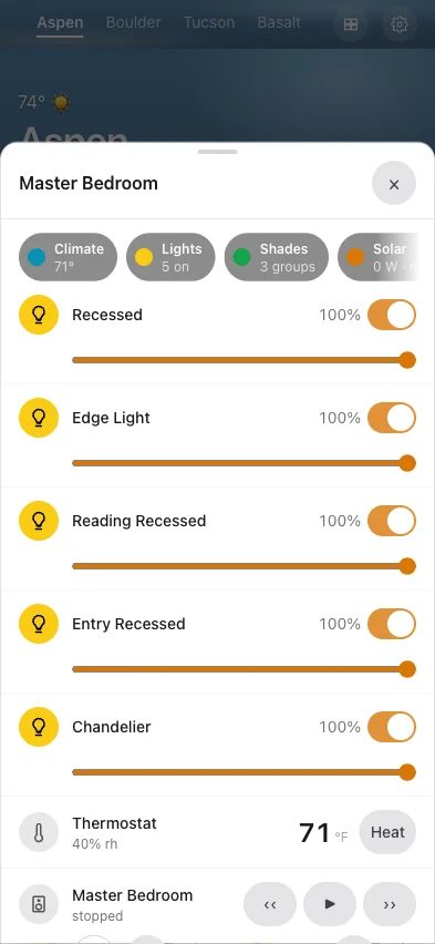 The Aspen master bedroom on a phone - five Lutron dimmers with sliders at 100 percent, a Nest thermostat reading 71 degrees, and the Sonos speaker for that room, all in one sheet